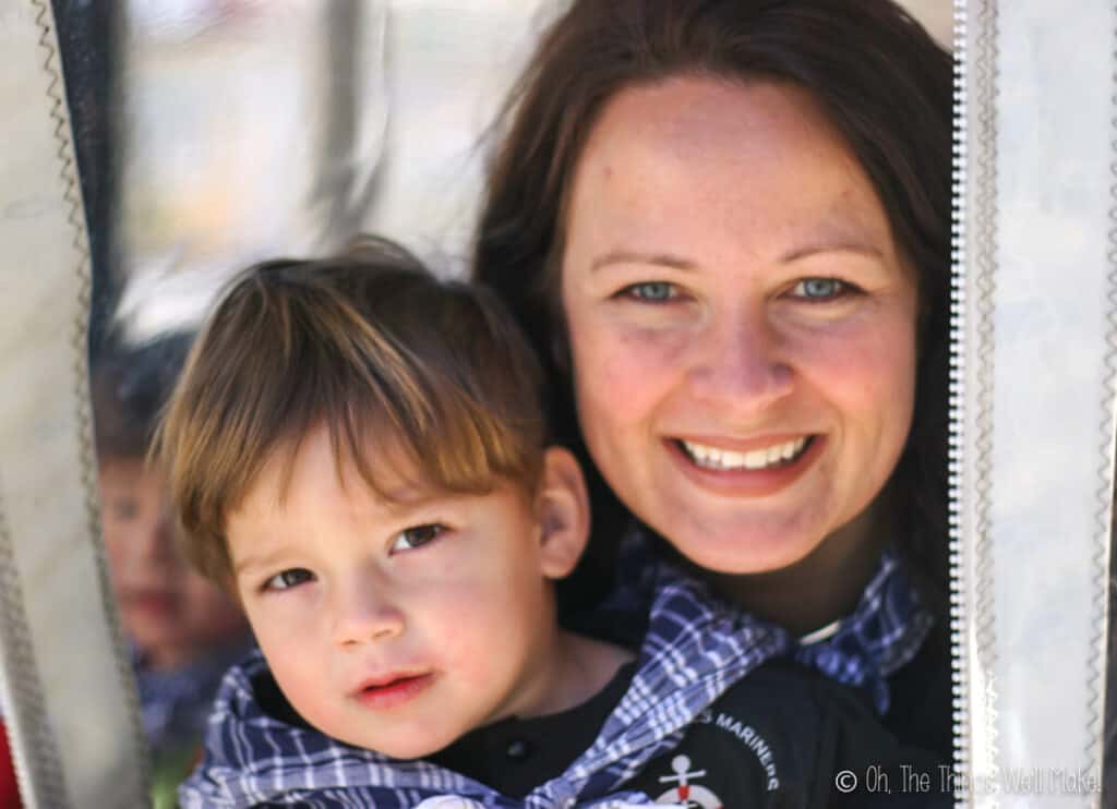 Tracy Ariza holding her son.