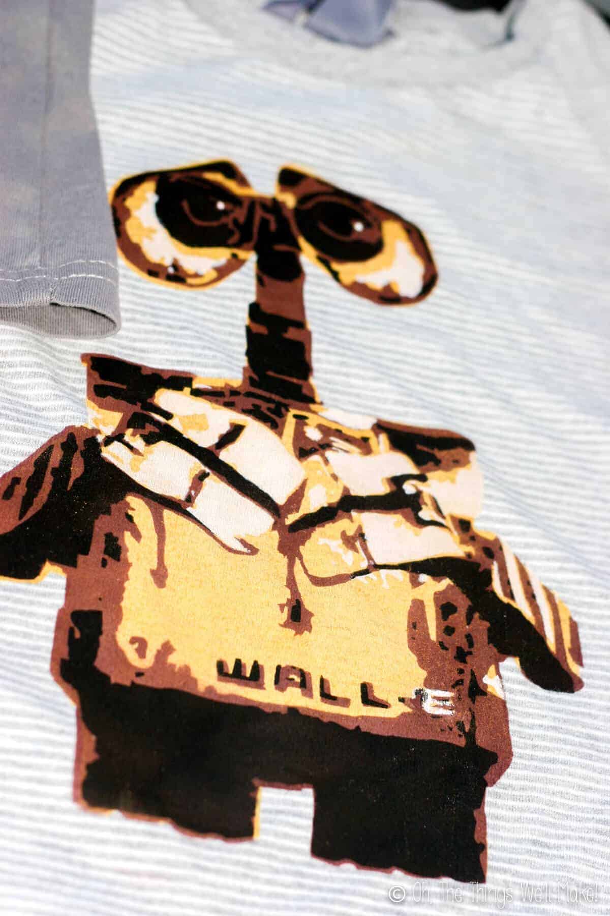 Closeup of the finished Wall-E stencil design painted on t-shirt