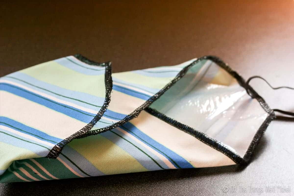 Close up of folding the left corner over the center of the sandwich wrap