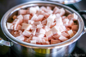 cubes of pork fat in a pan, ready for rendering to lard