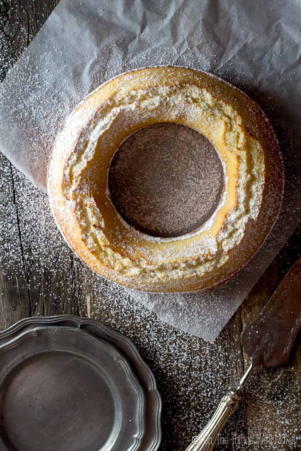 Overhead view of a circular ciambella allo yogurt, an Italian lemon breakfast cake.