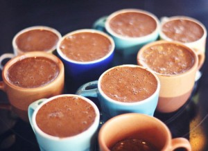 8 cups filled with chocolate mousse made with eggs