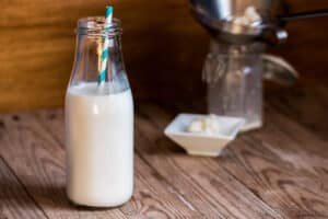 Milk kefir can be made with a variety of milks (from animals and vegetables.) It's easy to make and can be used in a number of ways. Learn how to make kefir at home and benefit from this probiotic beverage. #thethingswellmake #miy #kefir #probiotics #guthealth #homemadekefir #kefirrecipes #fermenting #traditionalrecipes #fermentedfoods #dairyrecipes