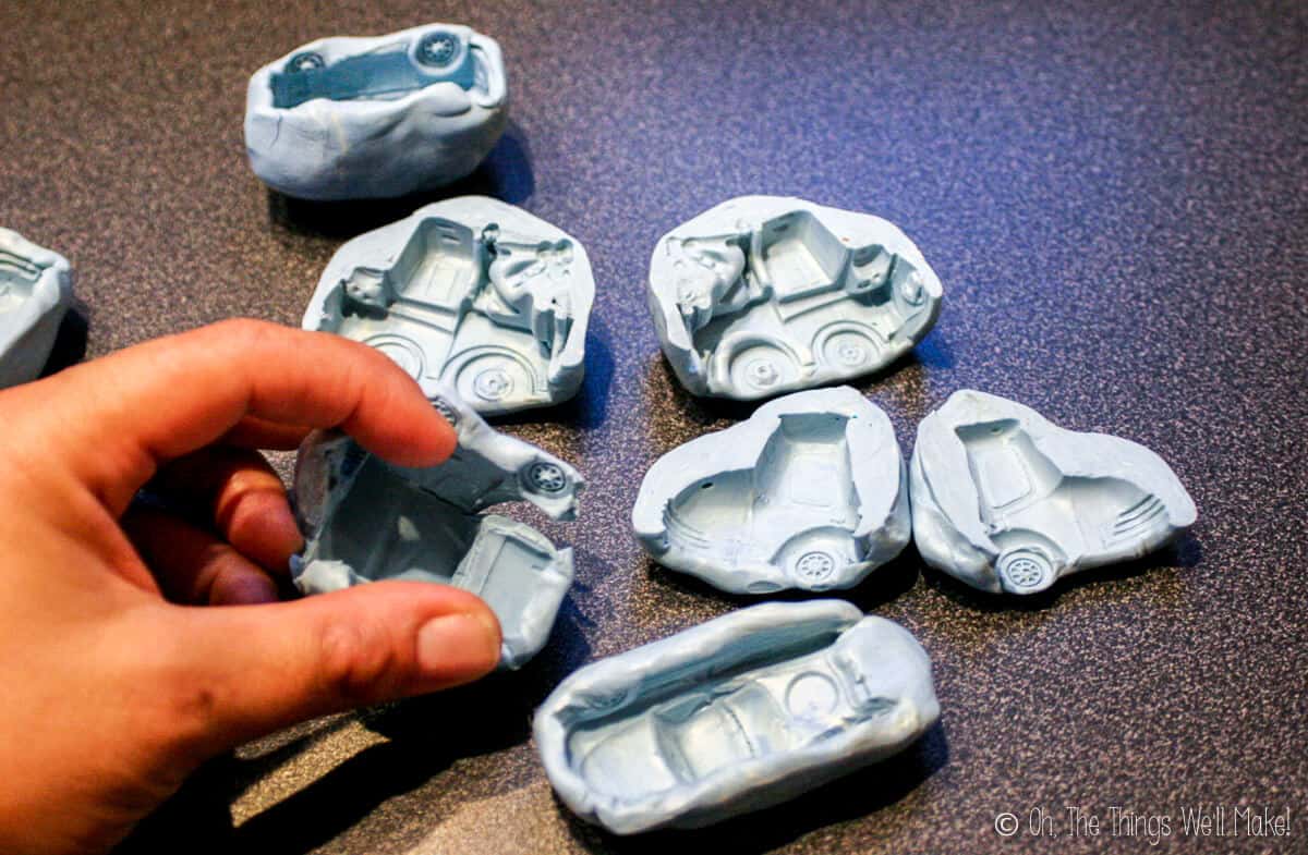 Several different homemade silicone molds of different car characters from the Cars movies.