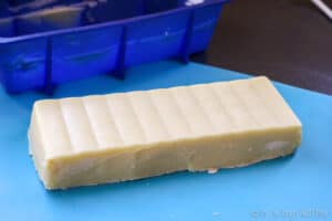 A block of soap after having unmolded it from a siliicone loaf pan.