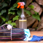 photo of large bottle of soap based wipes solution and homemade cloth wipes