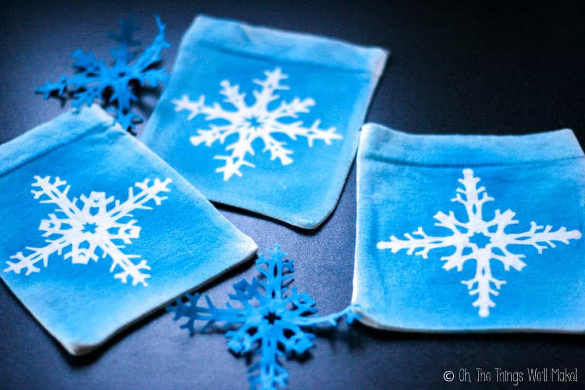 Three snowflake pouches with the freezer paper removed.