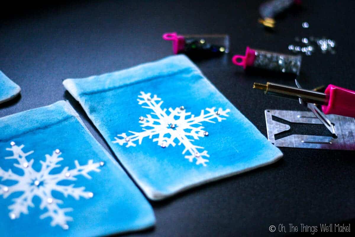 Snowflake pouches embellished with rhinestones