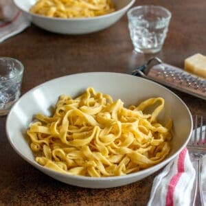A bowl of homemade pasta noodles (fettuccini)