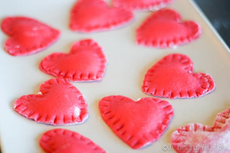 pink heart shaped ravioli tinted with beetroot juice