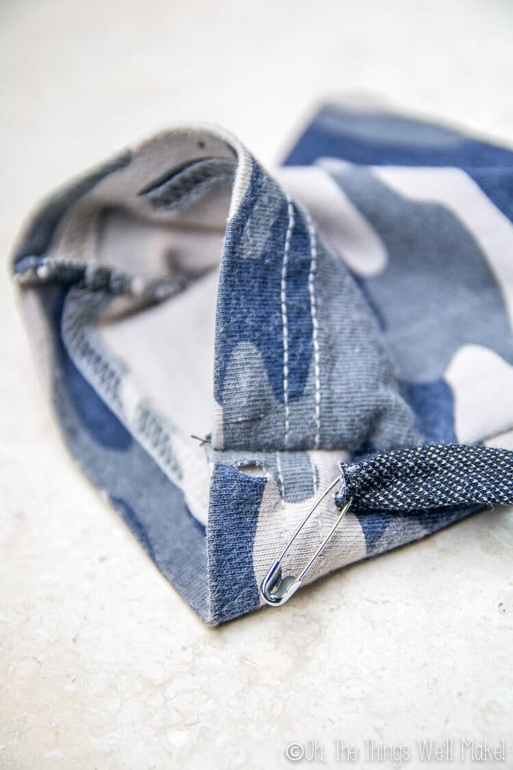 Here you can see the small slits in the hem enclosure on either side of the seam.