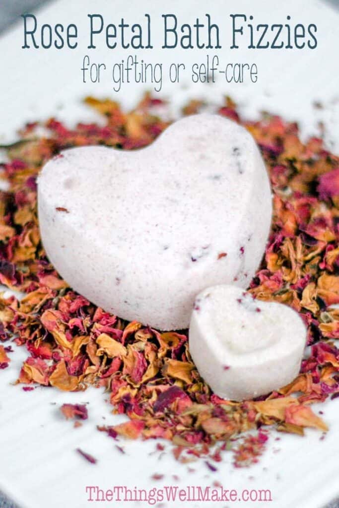 Soothe your skin and relax in a luxurious bath using these homemade rose petal bath bombs (bath fizzies). They're great for gifting or much-needed self-care. #thethingswellmake #miy #bathbombs #selfcare #valentinesday #bathtimefun #bathtime #selfcaretips #relaxation #relaxdestressideas #valentinesdaycraft