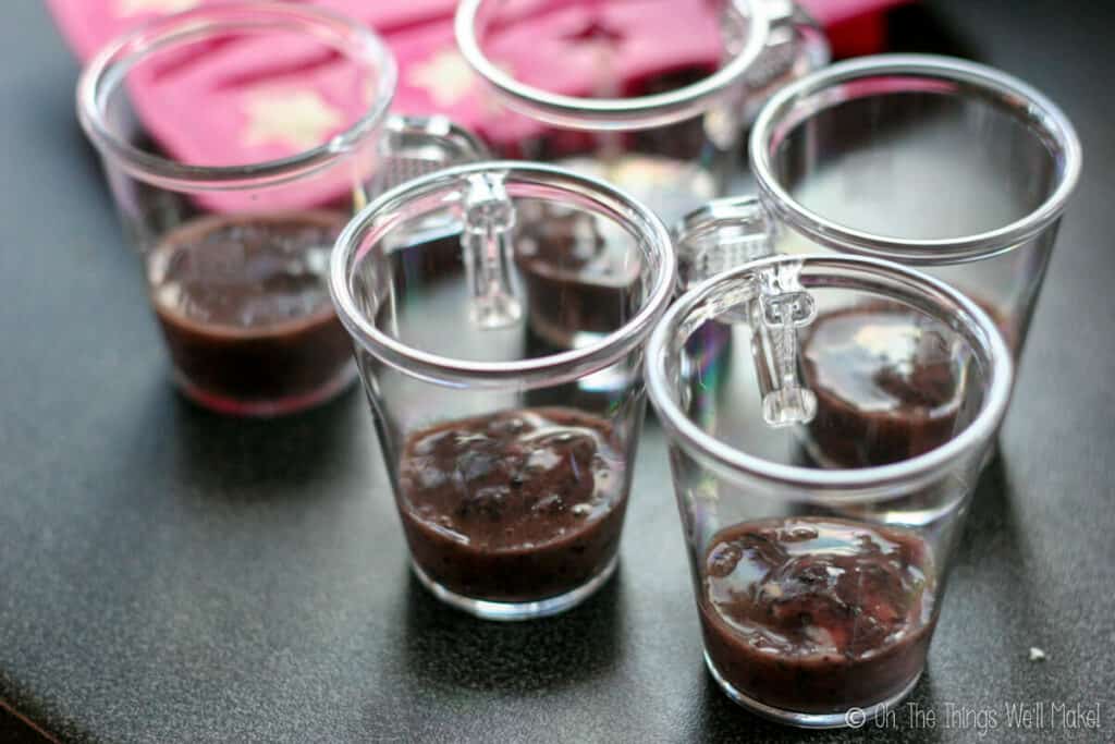 Cups with blueberry puree