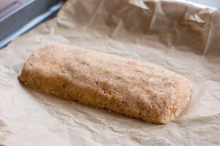 A formed log of dough for the first baking of biscotti