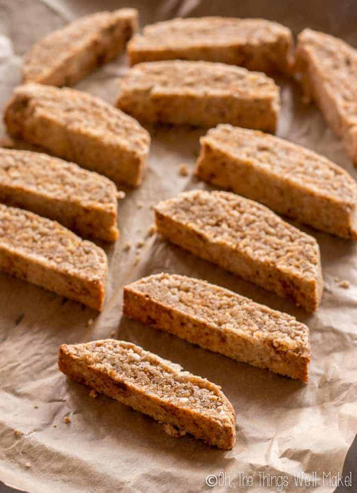 Sliced biscotti on a baking sheet, ready for their second baking.