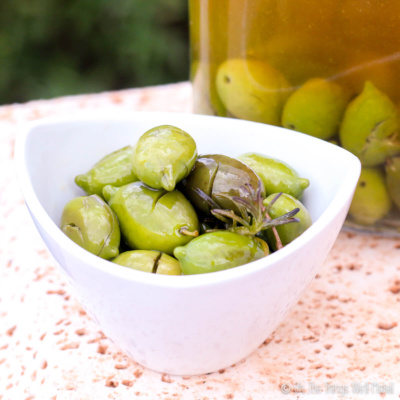 A bowl full of homemade brined (salt cured) green olives
