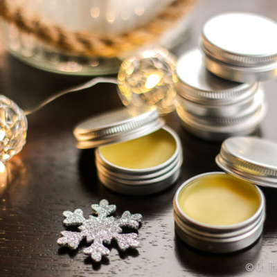 Several tins of solid perfume with lights