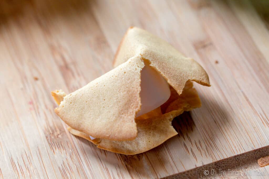 A broken fortune cookie. It broke while folding it into shape.