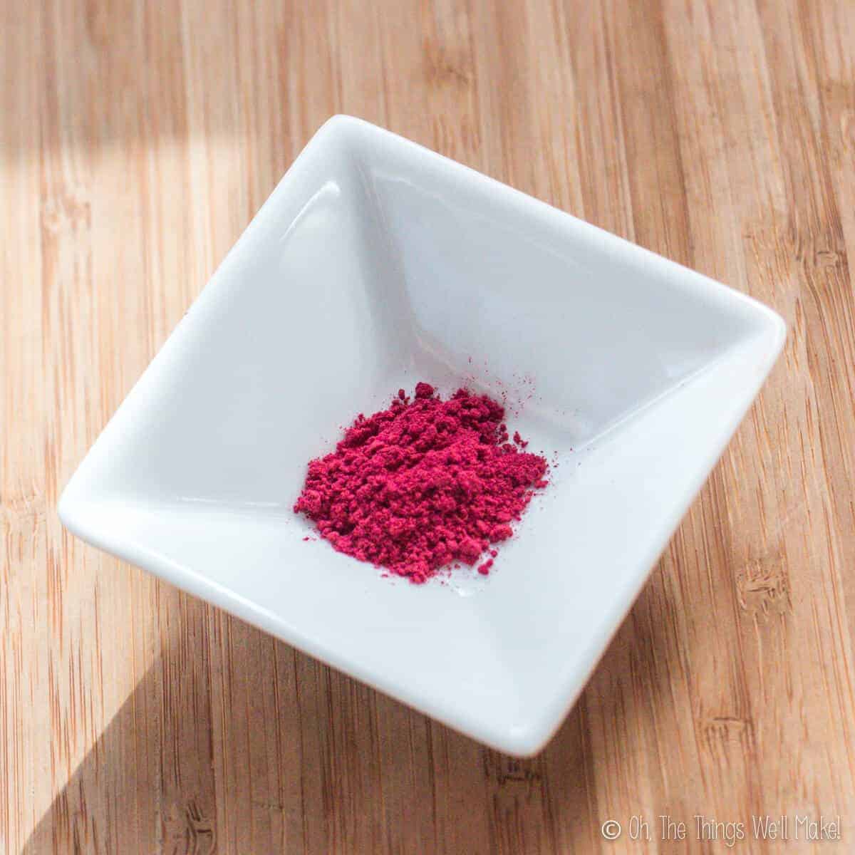 overhead view of a small bowl with beetroot powder