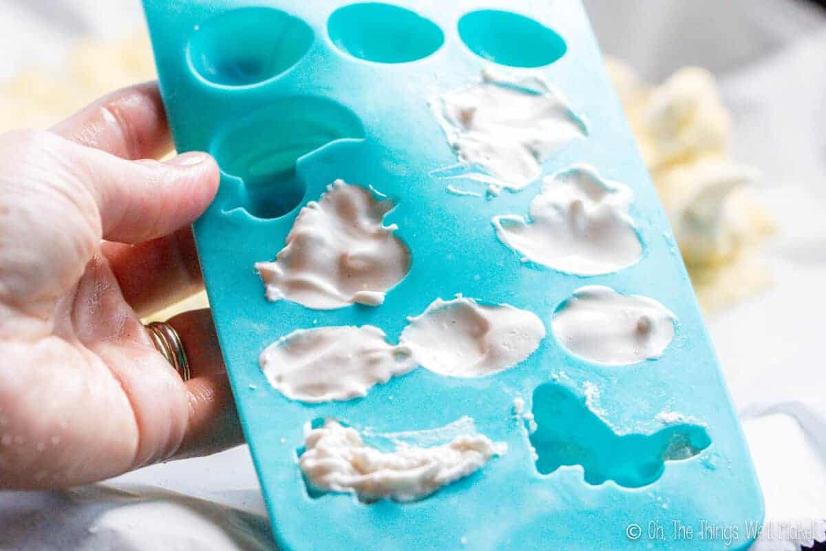 Marshmallow mixture in Easter shaped silicone tray, unevenly filled