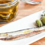 Homemade salt cured anchovy fillets are easy to make, healthy, and very tasty. Read how to clean the fish, cure it, and store it.