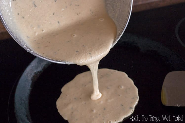 Pouring the mixture onto a hot skillet
