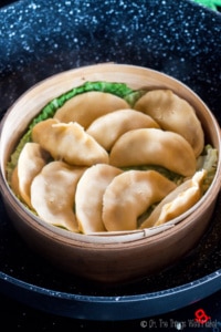 This paleo dim sum recipe uses a paleo pasta filled with flavorful ginger and pork and is steamed to perfection to make these amazing Asian potstickers.