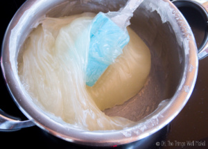 A thick cornstarch mixture being cooked in a pan