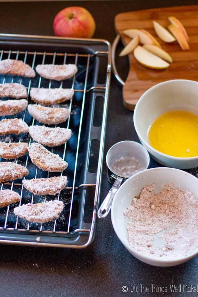 a grill with prepared apple fries ready to be broiled
