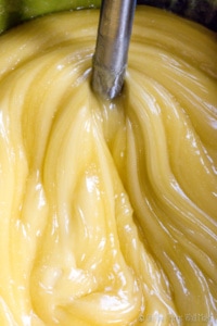 Closeup of a glossy looking soap paste that is starting to get translucent