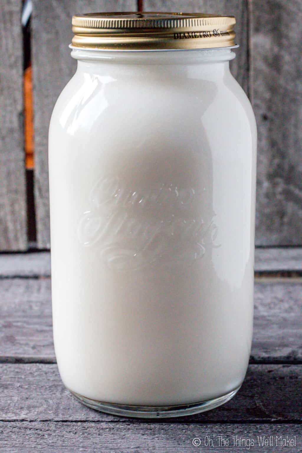 A jar of coconut oil based liquid soap that looks opaque white