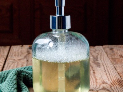 a bottle of clear liquid soap made with coconut oil