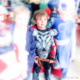 Closeup of a boy dressed up as Thor at a costume party. (The other kids are blurred out.)
