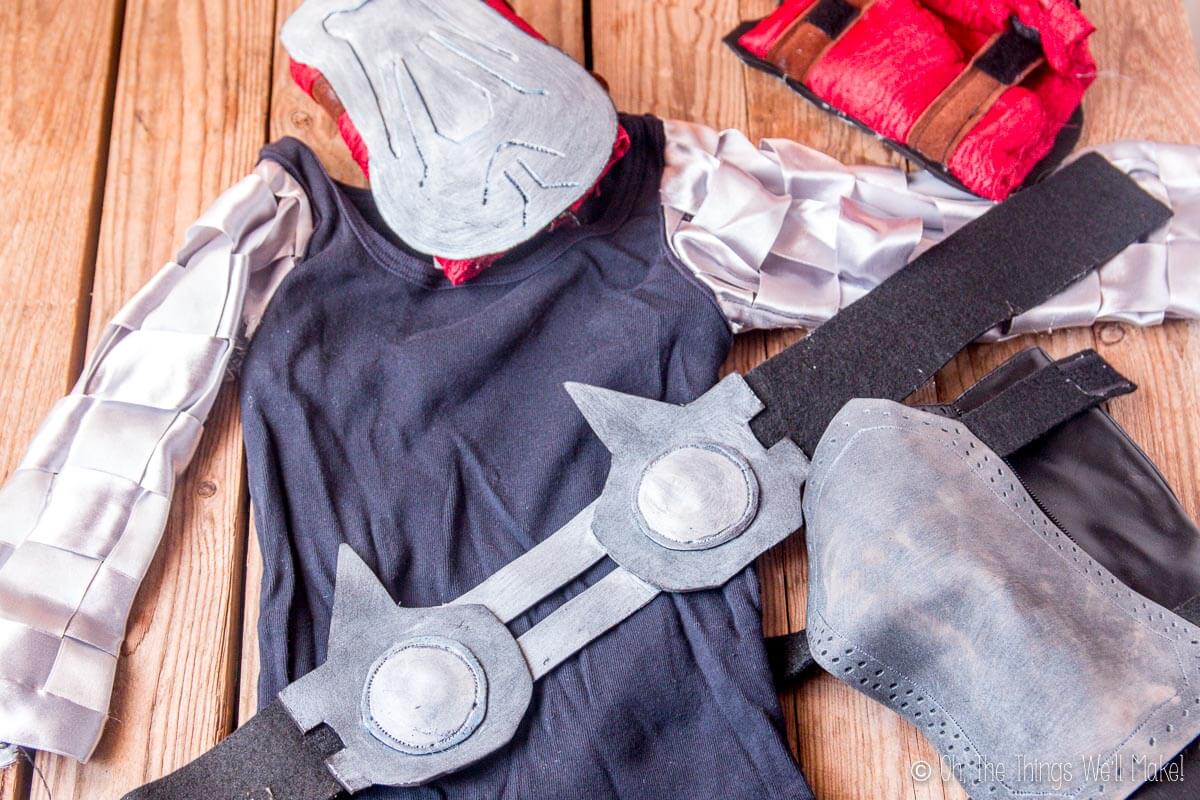 photo of the individual pieces of a Thor costume spread out on the ground.