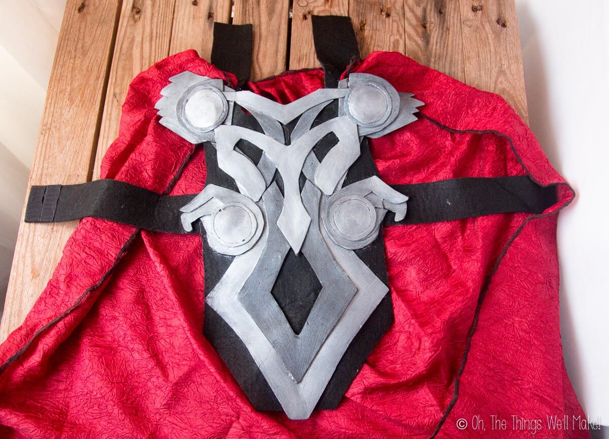 Making Thor's belt out of felt and Thor's chest armor out of painted craft foam for a DIY Thor costume.