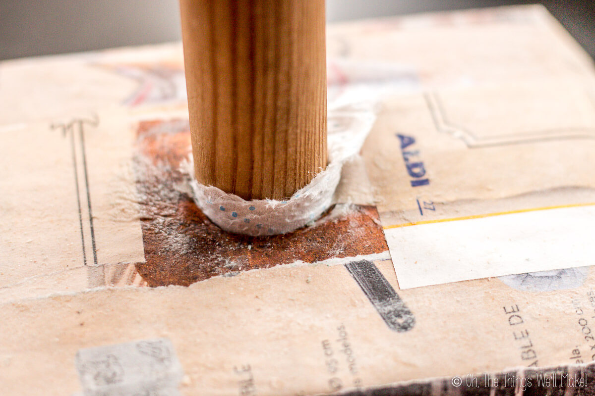 closeup of the area where the dowel is inserted into the base of what will be Thor's hammer.