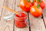 Conserve excess tomatoes with an easy, homemade tomato paste that can be made on the stove top, in your oven, or in a slow cooker.