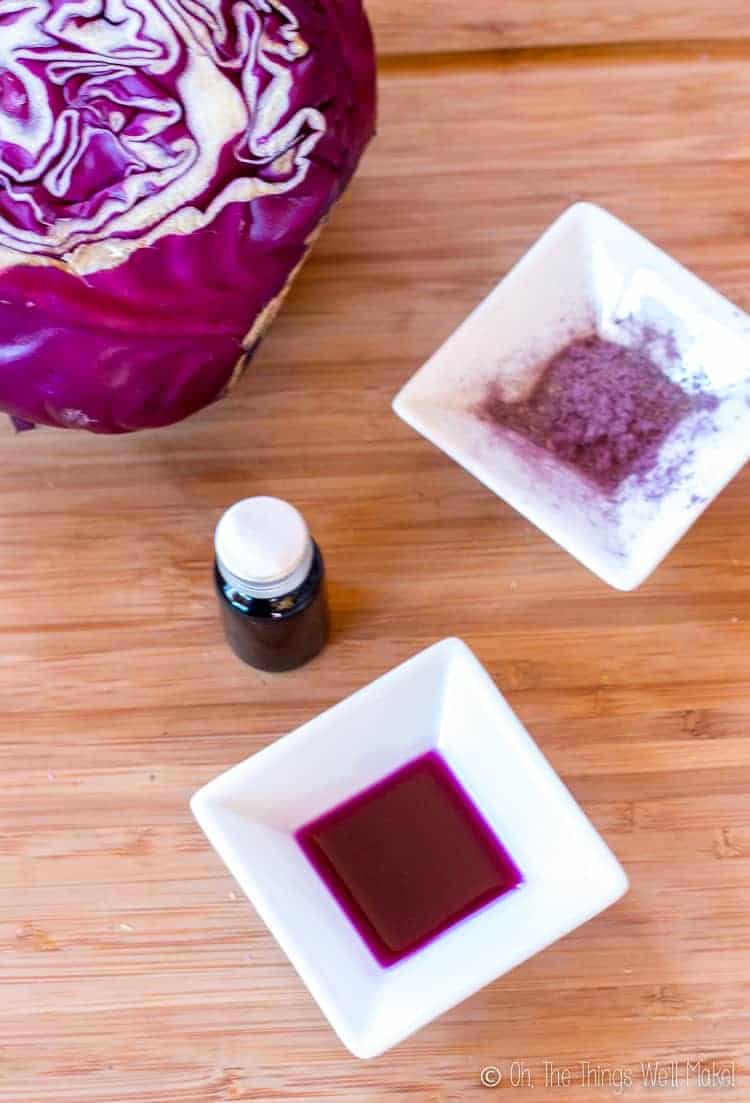 Overhead view of red cabbage, red cabbage powder, and red cabbage juice, ready for pH testing.