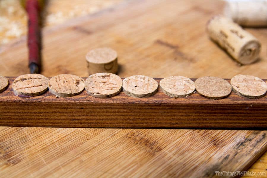 Using recycled materials like scraps of wood and wine corks, you can make a handy DIY earring holder for studs and post earrings that is also a beautiful and practical display organizer.