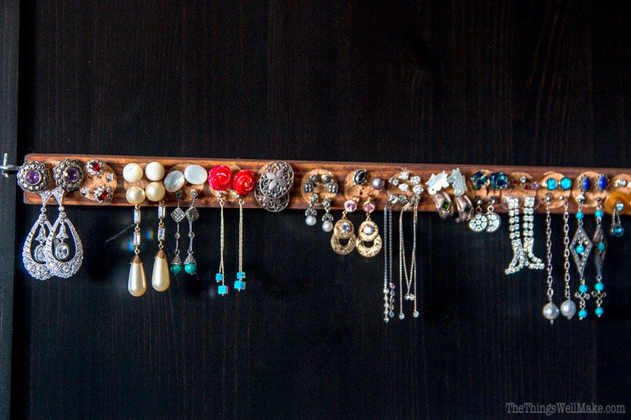 Closeup of an earring holder made with wine corks