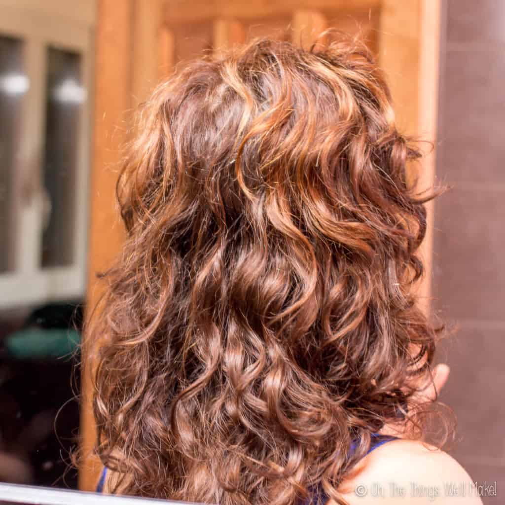 A closeup of wavy hair from the back