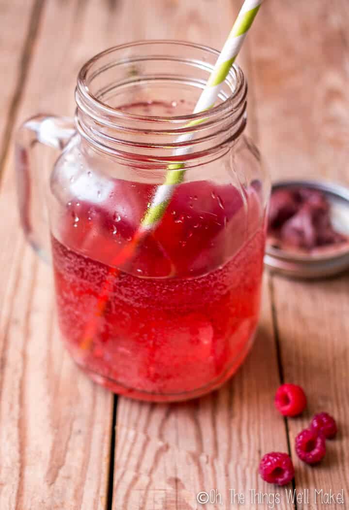 Ditch the unhealthy sodas, and switch to a much healthier paleo red pop, or red soda, which can be made two ways using a combination of herbs, fruits, and soda water.