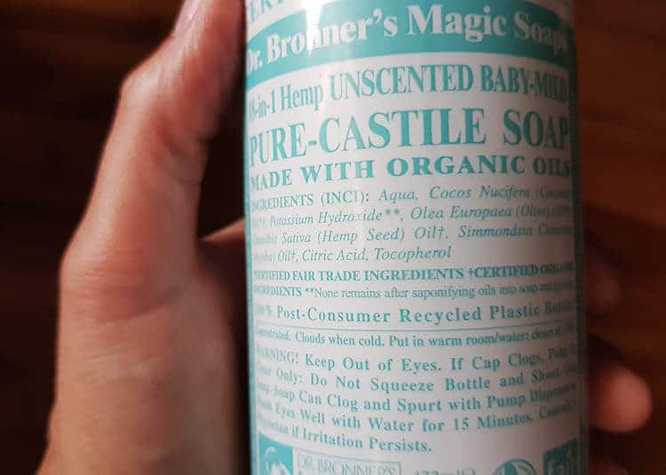 Closeup of the label of a bottle of Dr. Bronner's liquid Castile Soap