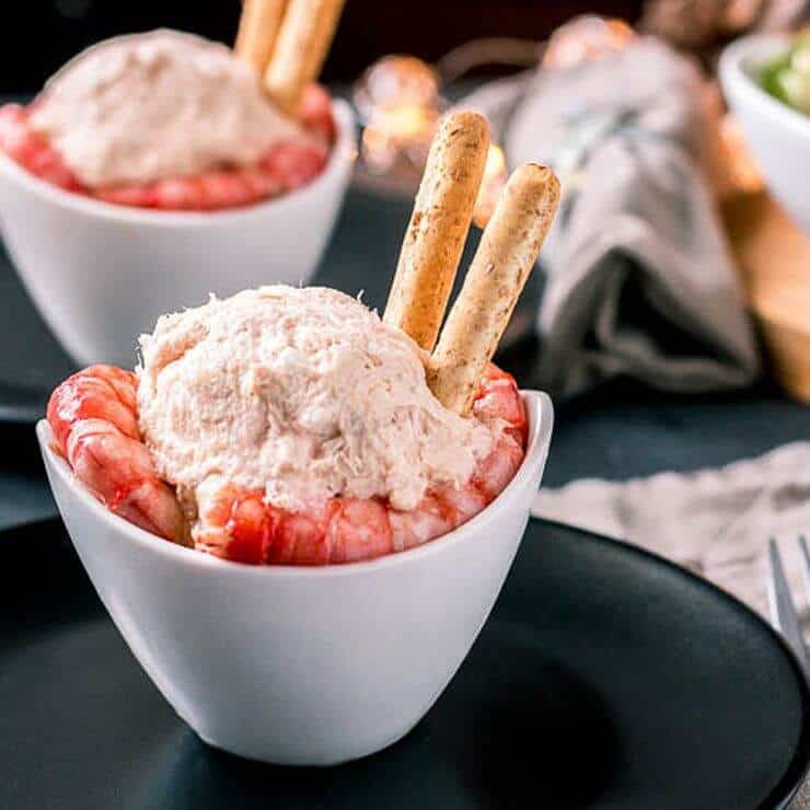 creamy Spanish seafood salad served with shrimp and cracker sticks
