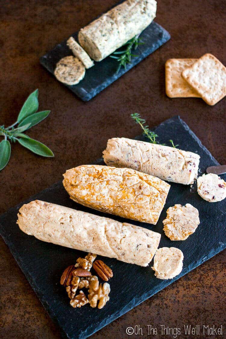 Various types of compound butters displayed on a platter.