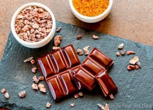 Avoid emulsifiers and other unwanted ingredients and control the process by making your own homemade chocolate bars from cocoa nibs. #chocolate #cacao #cocoa