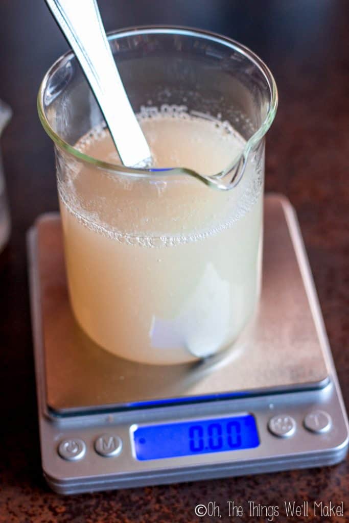 Final homemade shampoo, made with distilled water, in a beaker, ready to be bottled.