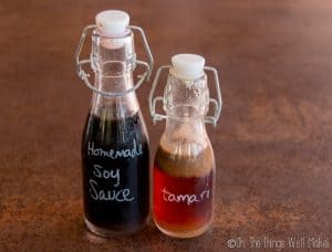 Bottles of homemade soy sauce and homemade tamari after being outside for 3 months.