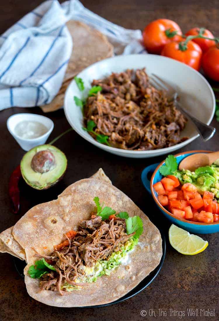 Shredded beef taco ready to be wrapped and eaten.