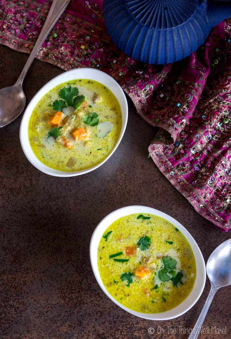 Two bowls of Chicken Mulligatawny soup.